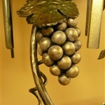 close up of metal grapes and vines